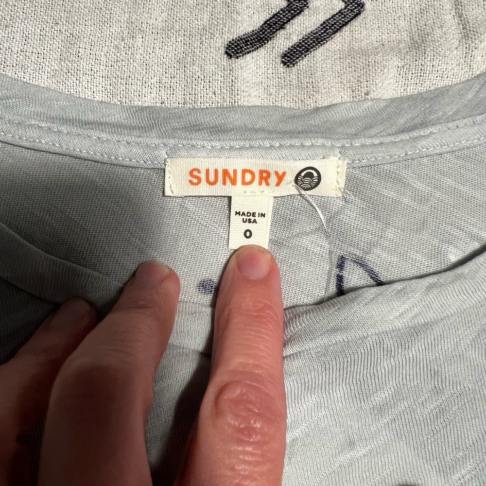 Sundry Light Gray/Blue “Hola/Adios”Casual Tee with Ruffled Sleeves.